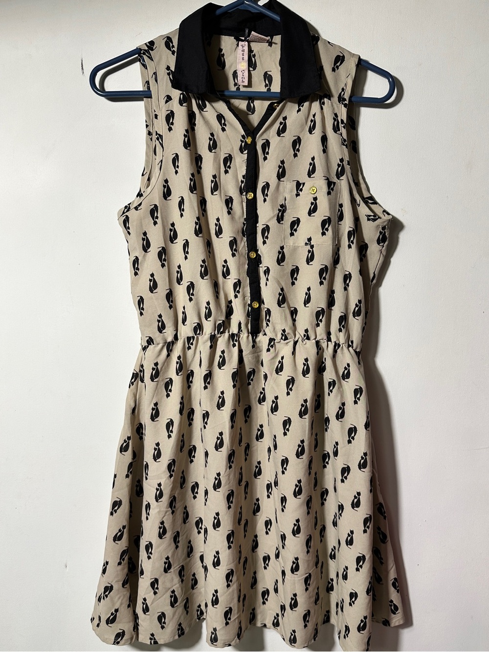 Beige Sleeveless Mini Dress with Black Cat Print and Contrast Collar